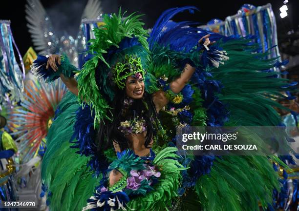 Member of the Beija Flor samba school performs during the second night of Rio's Carnival parade at the Sambadrome Marques de Sapucai in Rio de...