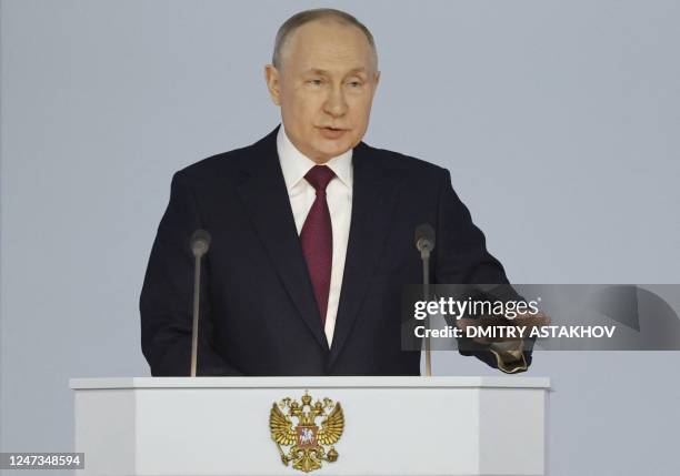 Russian President Vladimir Putin delivers his annual state of the nation address at the Gostiny Dvor conference centre in central Moscow on February...