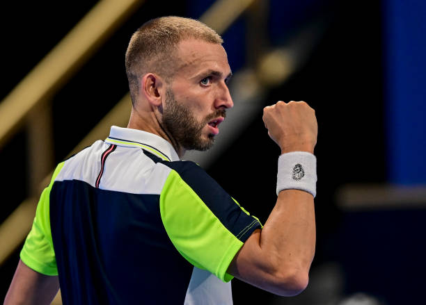 Daniel Evans of Great Britain reacts during first round match against Emil Ruusuvuori of Finland at the ATP Qatar Exxonmobil Open tennis tournament...