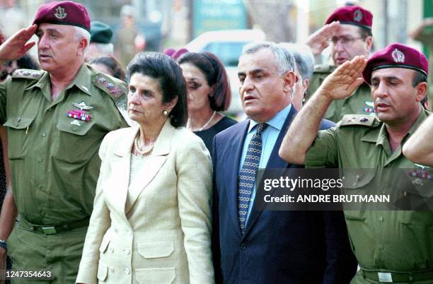 From left to right outgoing Israeli army Chief of Staff Ammon Shahak, Lea Rabin widow of late Israeli Premier Yitzhak Rabin, Israeli Defence Minister...