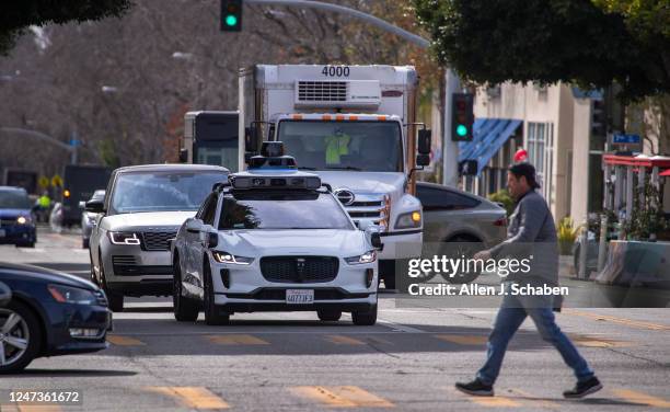 Santa Monica, CA Passengers ride in an electric Jaguar I-Pace car outfitted with Waymo full self-driving technology in Santa Monica Tuesday, Feb. 21,...