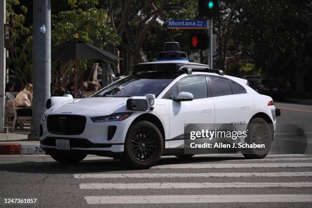 Santa Monica, CA Passengers ride in an electric Jaguar I-Pace car outfitted with Waymo full self-driving technology in Santa Monica Tuesday, Feb. 21,...