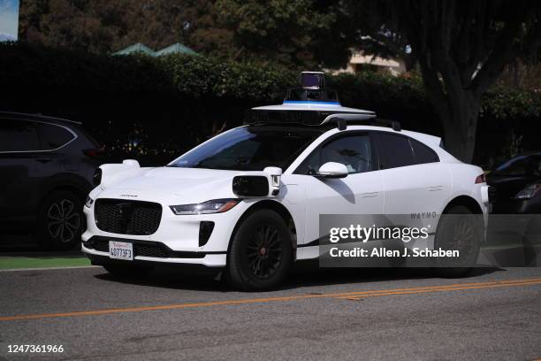 Santa Monica, CA Passengers ride in an electric Jaguar I-Pace car outfitted with Waymo full self-driving technology in Santa Monica Tuesday, Feb. 21,...