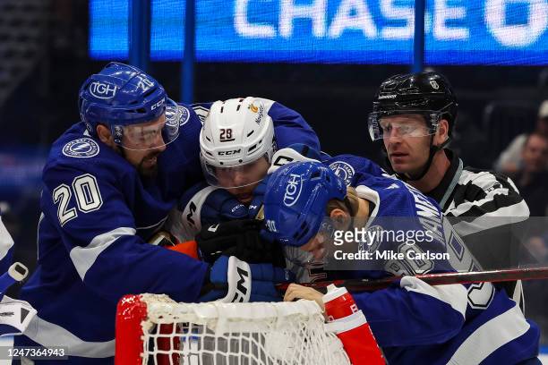 Nicholas Paul and Vladislav Namestnikov of the Tampa Bay Lightning battle against Nathan Beaulieu of the Anaheim Ducks during the first period at...