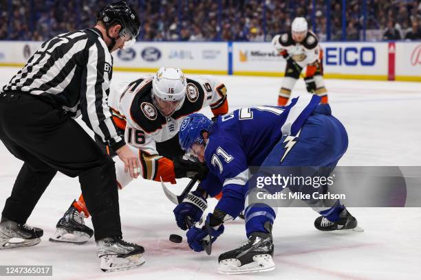 Anthony Cirelli of the Tampa Bay Lightning faces off against Ryan Strome of the Anaheim Ducks during the first period at Amalie Arena on February 21,...