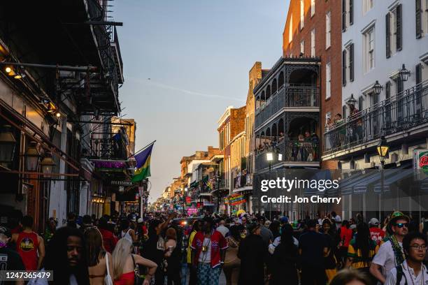 Mardi Gras participants walk down Bourbon Street on February 21, 2023 in New Orleans, Louisiana. Fat Tuesday marks the last day of Carnival season,...