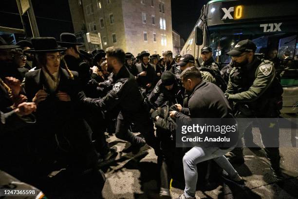 Israeli forces intervene Haredi Jews during the protest against the detention of an ultra-Orthodox Jewish person by Israeli police in West Jerusalem...