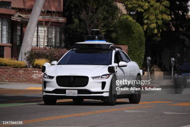 Santa Monica, CA Passengers ride in an electric Jaguar I-Pace car outfitted with Waymo full self-driving technology in Santa Monica Tuesday, Feb. 21,...