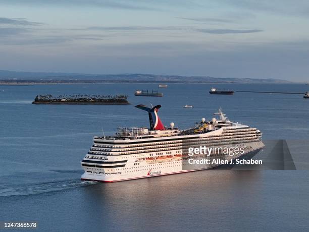 Long Beach, CA An aerial view of the Carnival Radiance, a Destiny-class cruise ship, as it heads out to sea in Long Beach at sunset Friday, Feb. 17,...