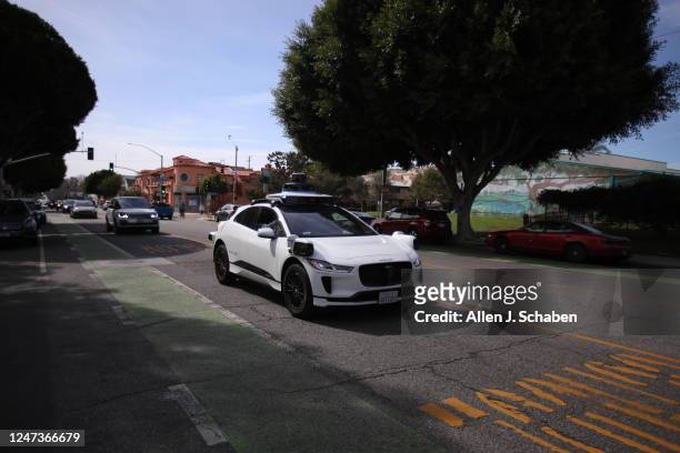 Santa Monica, CA Passengers ride in an electric Jaguar I-Pace car outfitted with Waymo full self-driving technology in Santa Monica Tuesday, Feb. 21,...