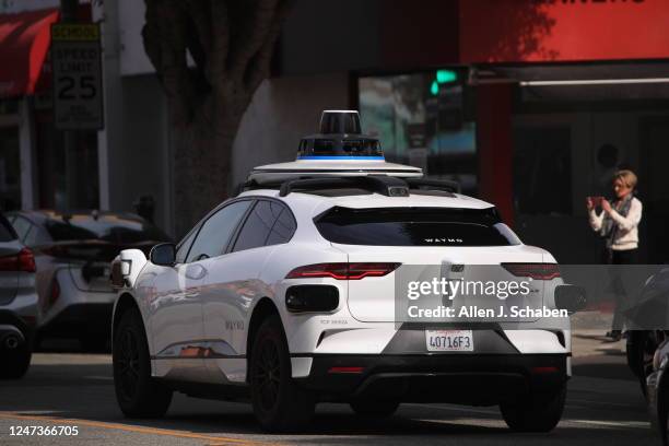 Santa Monica, CA Passengers ride in an electric Jaguar I-Pace car outfitted with Waymo full self-driving technology in Santa Monica Tuesday, Feb. 21,...