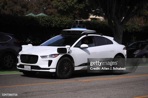 Santa Monica, CA Passengers ride in an electric Jaguar I-Pace car outfitted with Waymo full self-driving technology in Santa Monica Tuesday, Feb. 21,...