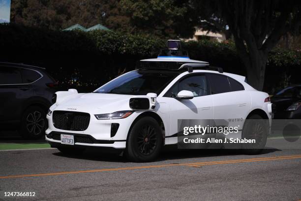 Santa Monica, CA Passengers ride in an electric Jaguar I-Pace car outfitted with Waymo full self-driving technology in Santa Monica Tuesday, Feb. 21,...