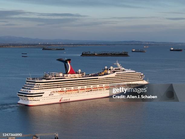 Long Beach, CA An aerial view of the Carnival Radiance, a Destiny-class cruise ship, as it heads out to sea in Long Beach at sunset Friday, Feb. 17,...