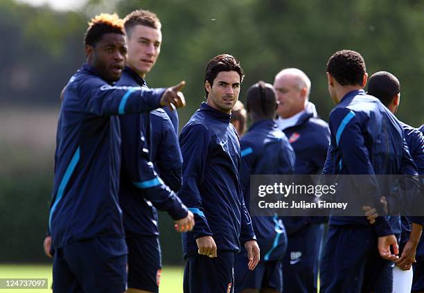 Mikel Arteta of Arsenal looks on during a training session ahead of their UEFA Champions League Group match against Borussia Dortmund, London Colney...