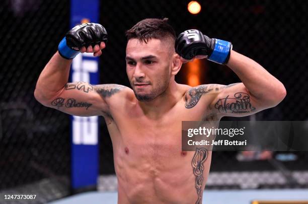 Alex Perez celebrates after his TKO victory over Jussier Formiga in their flyweight bout during the UFC 250 event at UFC APEX on June 06, 2020 in Las...