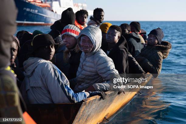 Group of 40 migrants waits for the rescue team of the humanitarian vessel Aita Mari to hand them life jackets. At around 7:30 a.m. On Tuesday, 21...