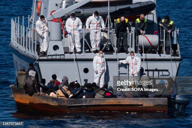 The crew of a Guardia di Finanza boat rescuing 40 to 50 migrants. At around 7:30 a.m. On Tuesday, 21 February, 40 sub-Saharan migrants were rescued...
