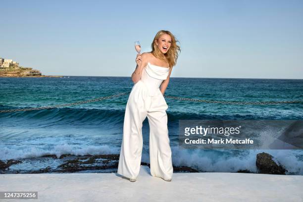 In this image released on February 22 Kylie Minogue celebrates the eve of WorldPride with her award-winning Rosé at the world-famous Bondi Icebergs...