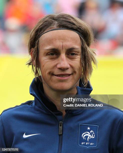 France's midfielder Sandrine Soubeyrand poses for a group photo prior to the quarter-final match of the FIFA women's football World Cup England vs...