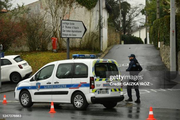 Municipal police secure a perimeter around Saint-Thomas dAquin middle school where a teacher died after being stabbed by a student, in...