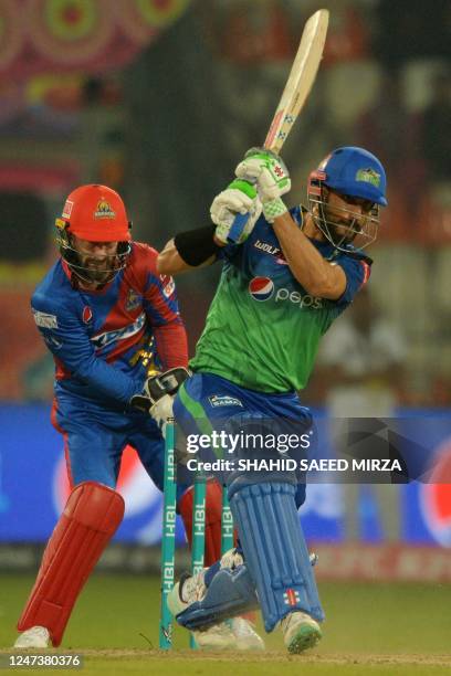 Multan Sultans' Shan Masood plays a shot during the Pakistan Super League T20 cricket match between Karachi Kings and Multan Sultans at the Multan...