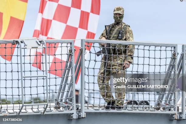 Military personnel stands on board the Russian military frigate "Admiral Gorshkov" docked at the port in Richards Bay on February 22, 2023. - South...