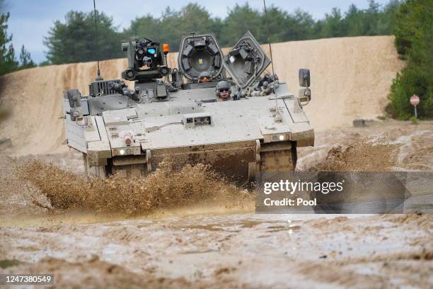 An Ajax Ares tank, an armored personnel carrier, on the training range at Bovington Camp during a visit by Defence Secretary Ben Wallace on February...