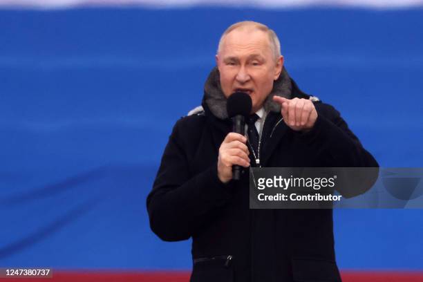 Russian President Vladimir Putin speaks during a concert in Luzhniki Stadium on February 22, 2023 in Moscow, Russia. Thousands of people gathered at...