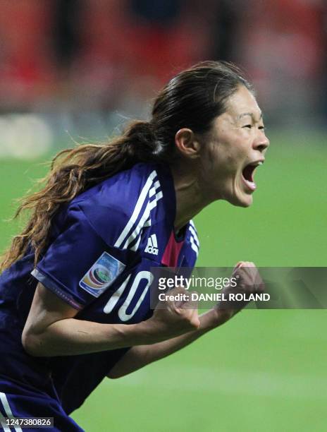 Japan's midfielder Homare Sawa celebrates scoring during the FIFA Women's Football World Cup final match Japan vs USA on July 17, 2011 in Frankfurt...