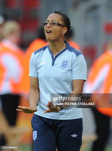 England's coach Hope Powell reacts during the quarter-final match of the FIFA women's football World Cup England vs France on July 9, 2011 in...