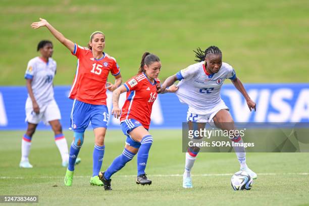Isidora Olave of Chile National Women's soccer team and Roselord Borgella of Haiti National Women's soccer team seen in action during the FIFA...