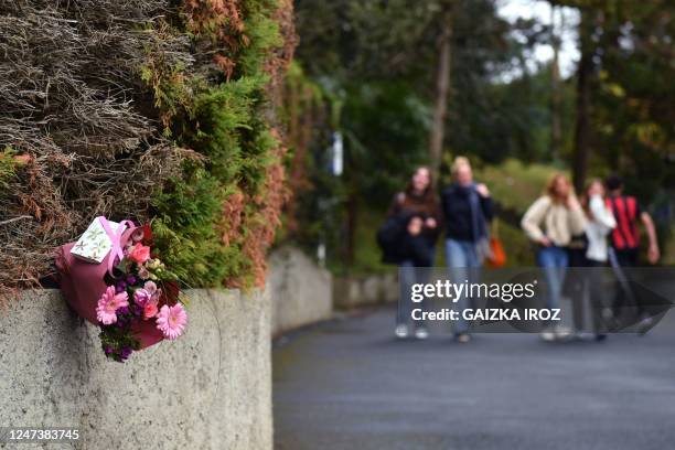 Photo shows flowers layed at the entrance of Saint-Thomas dAquin middle school, where a teacher died after being stabbed by a pupil, in...