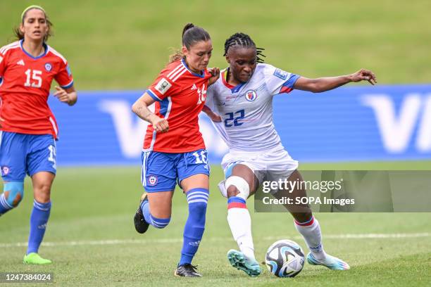 Isidora Olave of Chile National Women's soccer team and Roselord Borgella of Haiti National Women's soccer team seen in action during the FIFA...