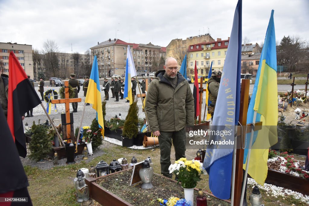 Shmyhal Prime Minister of Ukraine Denys Shmyhal at the grave of a Ukrainian ...