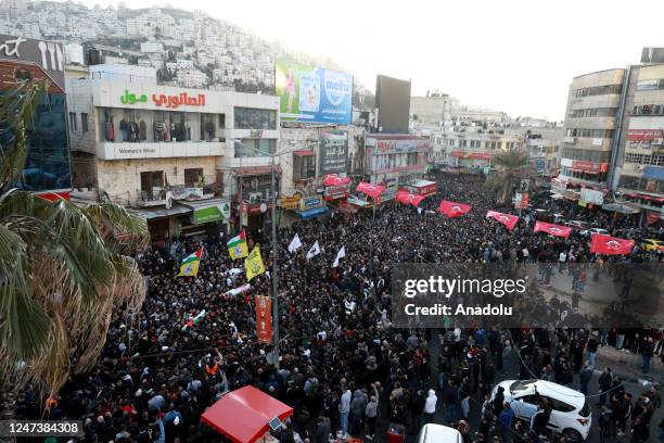 Thousands attend the funeral held for 10 Palestinians who died during the Israeli forces' raid in Nablus, West Bank on February 22, 2023.