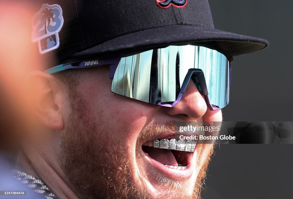 Boston Red Sox OF Alex Verdugo shows off his grill during a Spring