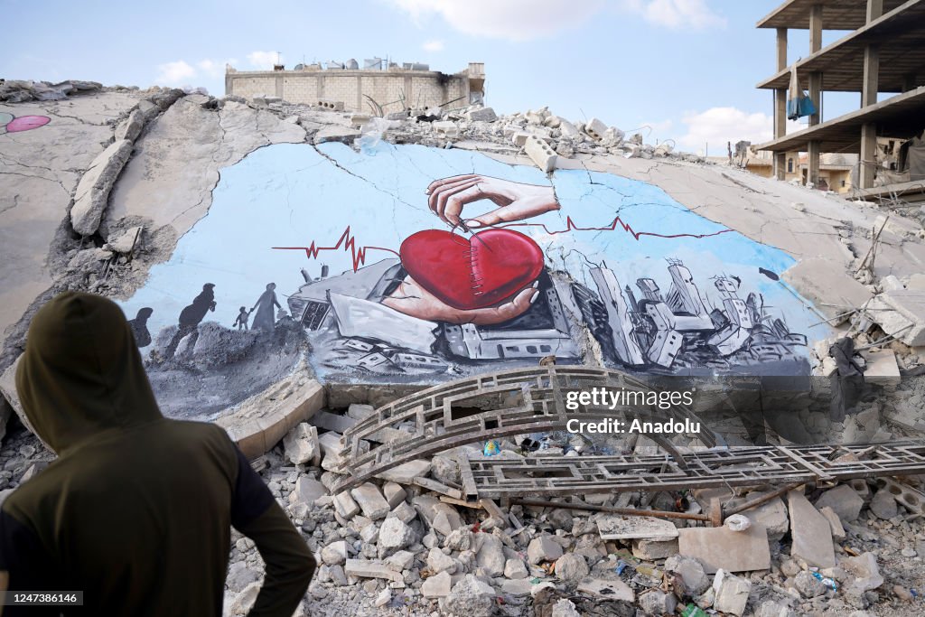 Syrian graffiti artists paint the struggle of the earthquakes on rubble