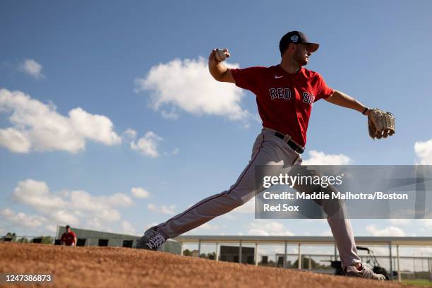 Garrett Whitlock of the Boston Red Sox throws during a Spring Training team workout on February 22, 2023 at JetBlue Park at Fenway South in Fort...