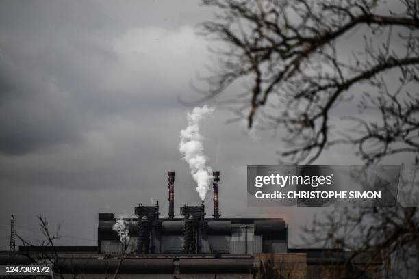This photograph taken on February 22 shows the steelwork site of an ArcelorMittal factory, as the site goes through a plan to reduce its carbon...