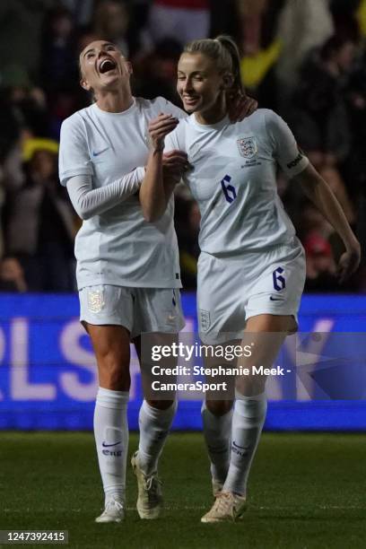 England's Leah Williamson celebrates scoring her side's second goal with team-mate Alex Greenwood during the Arnold Clark Cup match between England...