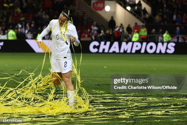 Lucy Bronze of England tries to untangle herself from the streamers during the Arnold Clark Cup match between England and Belgium at Ashton Gate on...