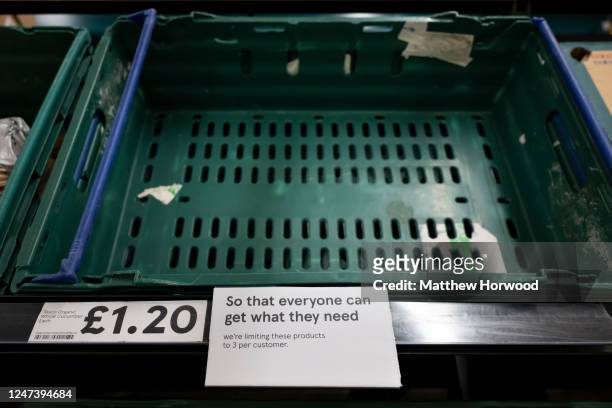 An empty shelf which would normally contain cucumbers on February 22, 2023 in Cardiff, Wales. Aldi, Asda, Morrisons and Tesco have placed limits on...