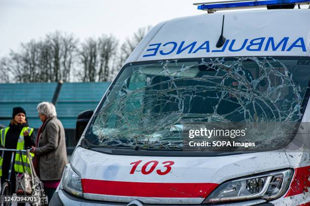 Dutch woman is seen talking with a Ukrainian volunteer from Mariupol. The Tour De Ambulance is a traveling exhibition featuring an ambulance that was...