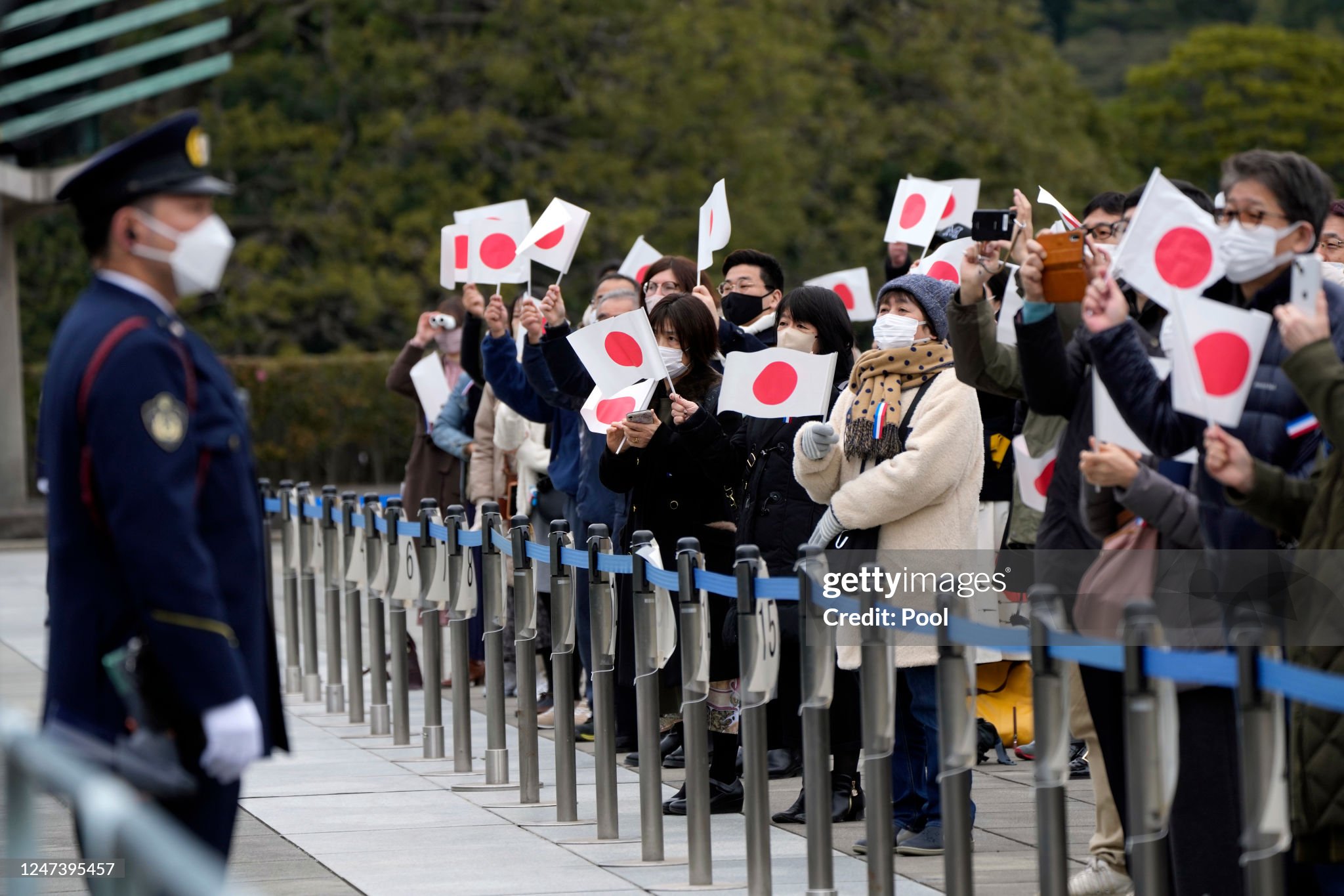 well-wishers-cheer-as-they-see-japans-emperor-naruhito-appear-on-the-balcony-of-the-imperial.jpg