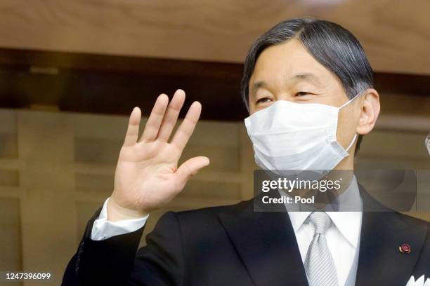 Japan's Emperor Naruhito waves to well-wishers as he appears on the balcony of the Imperial Palace to mark his 63rd birthday on February 23, 2023 in...