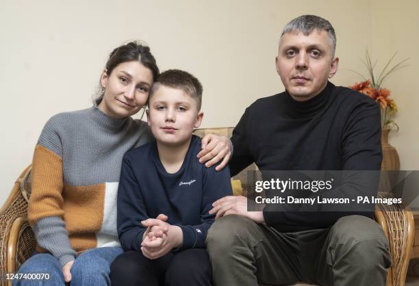 Ukrainian refugees Pavlo Romaniukha with his wife Rymma Parkhomenko-Romaniukha and their son Dmytro Parkhomenko-Romaniukh, who fled Ukraine, speaking...