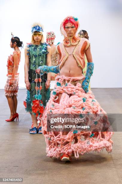 Models walk the runway wearing an outfit by Mata Durikovic of Slovak Fashion Council at the Madbymad fashion show during the London Fashion Week at...