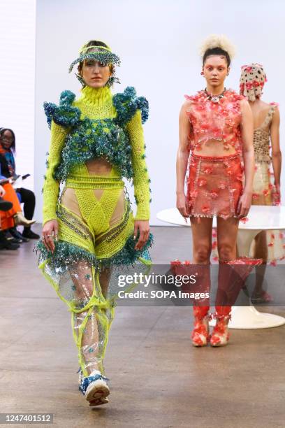 Models walk the runway wearing an outfit by Mata Durikovic of Slovak Fashion Council at the Madbymad fashion show during the London Fashion Week at...