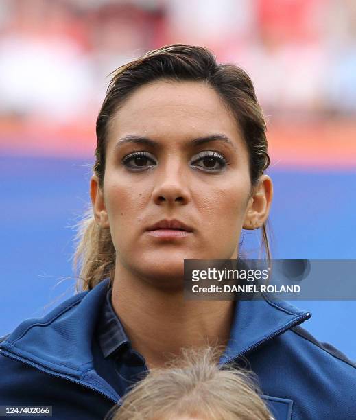 France's midfielder Louisa Necib poses for a group photo prior to the quarter-final match of the FIFA women's football World Cup England vs France on...